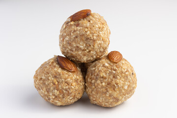 Indian sweets Mithai Gajjak Also Known As Gur Gajjak Gazak Gachak Made Of Jaggery Gud til or sesame seed Almonds Badam And Pistachio prepared for Makar Sankranti Lohri