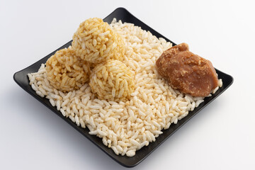 Winter delicacy Indian traditional sweets Mithai puffed rice ball Also Known As Lai or laiya Made Of Jaggery Gud til or sesame seed puffed rice and is prepared during Makar Sankranti Lohri