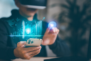 Man wearing VR glasses virtual hold smartphone Investment finance chart stock market business and financial growth graph. Business strategy development and growing growth plan,growth graph of business
