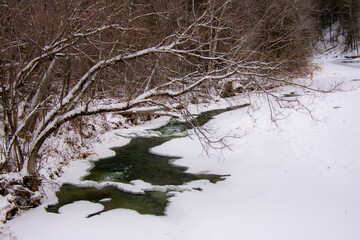 In december, icy river in the Canadian winter in the province of Quebec