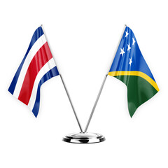 Two table flags isolated on white background 3d illustration, costa rica and solomon islands