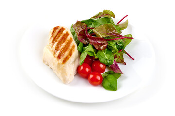 Grilled chicken breast served with mix salad, isolated on white background.