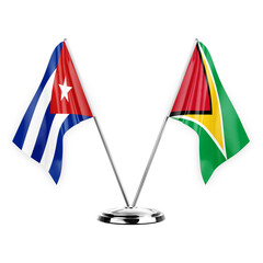 Two table flags isolated on white background 3d illustration, cuba and guyana