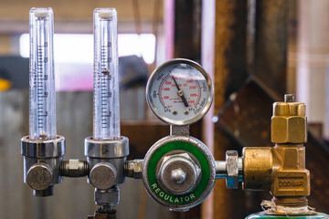 Pressure reducer. Gas cylinder equipment. Adjustment of the protective gas supply to the welding...