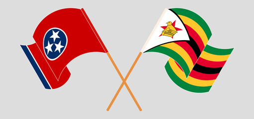 Crossed and waving flags of The State of Tennessee and Zimbabwe