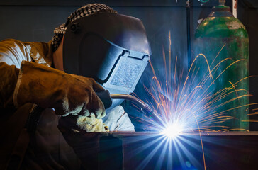 Welding of metal structures by semi-automatic arc welding. MIG welding.