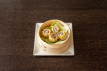 Dim sum is a food from various regions of China, among which the Cantonese and Shanghainese stand...