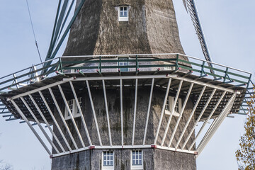 Amsterdam most iconic mill - De Gooyer Windmill. De Gooyer Windmill was built in 1725, the tallest wooden mill in the Netherlands. Amsterdam, The Netherlands.