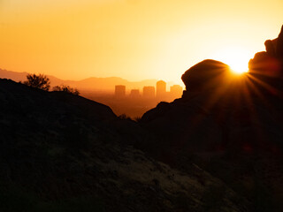Sunrays and Phoenix Cityscape from Camelback Mountain in Arizona