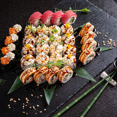 tasty sushi on the black background