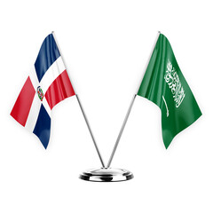 Two table flags isolated on white background 3d illustration, dominican republic and saudi arabia