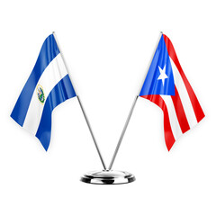 Two table flags isolated on white background 3d illustration, el salvador and puerto rico