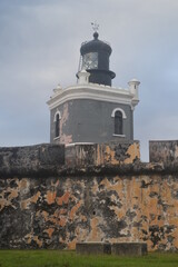 Old fortification walls with lighthouse,  Castillo San Felipe del Morro, San Juan, Puerto Rico