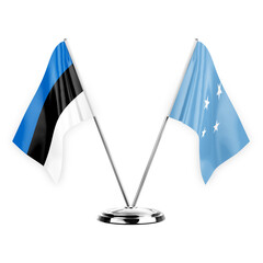 Two table flags isolated on white background 3d illustration, estonia and micronesia