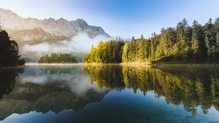 alps eibsee lake clouds blue mountains