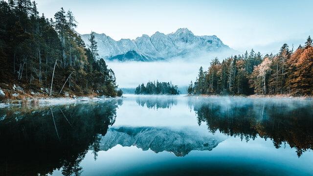 alps eibsee lake clouds blue mountains