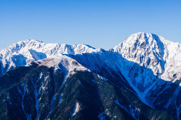 Obraz premium 南アルプスの山岳風景 冬 白峰三山