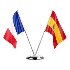 Two table flags isolated on white background 3d illustration, france and spain