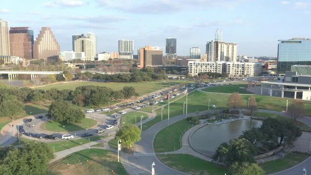 Line of cars at drive through COVID testing site in Downtown Austin Texas after christmas as Omicron variant surges