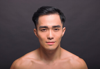 Closeup asian handsome young man face