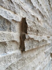 Natural stone surface texture on the walls of the house