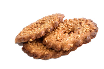 Delicious shortcrust pastry biscuits with peanut peanut topping on white isolated background. 