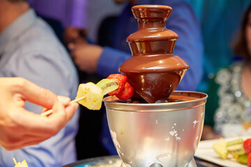 person eating chocolate