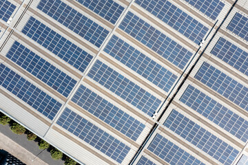 Fototapeta premium solar panels on factory rooftop