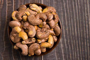 cashew nuts on wooden background