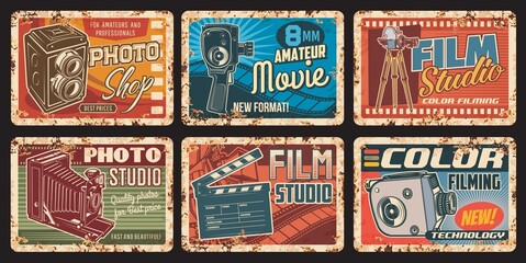 Film studio rusty metal plates, movie retro vector posters with vintage photo and video camera, film reel and clapper. Cinema, cinematography entertainment industry ferruginous cards, old camcorders © Vector Tradition