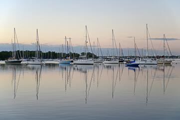Fototapeta premium Moored sailboats off Coconut Grove in predawn light on December 27, 2021.