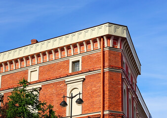 Facade of classical building of red color