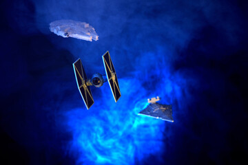 Naklejka premium Photo of star wars tie fighter, millennium falcon and star destroyer shot on april 26 2020