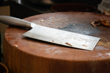 Butcher's knife on wooden cutting board. Meat Cleaver on cutting board