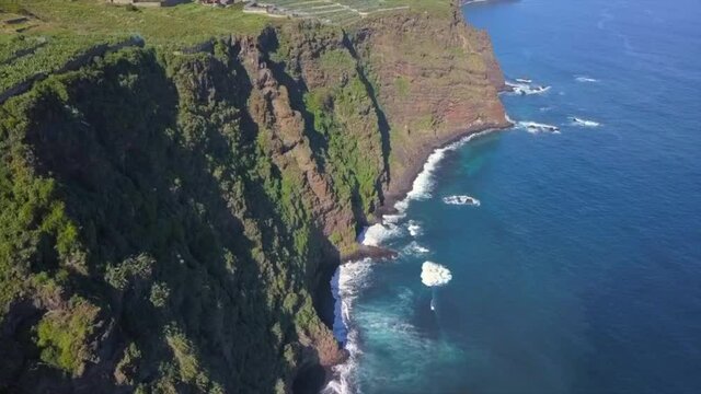 Scenic drone view of Los Nogales volcanic wild beach cliffs in La Palma island, Canaries.
