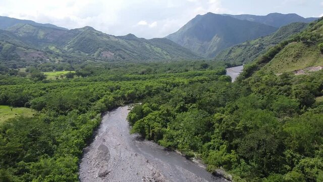 A beautiful river stream heading to the mountains.