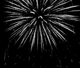 blurred multicolored fireworks lights on black background