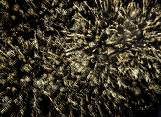 blurred multicolored fireworks lights on black background