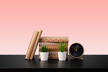 Stack of books on black wooden table