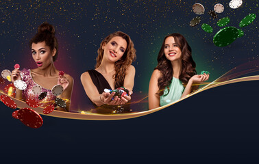 Three girls in smart dresses, jewelry. They holding chips, some of them flying, posing on blue...