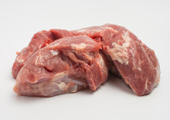 a large piece of fresh meat isolated on white. close-up