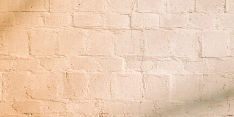 old wall beige background with old brick bricks