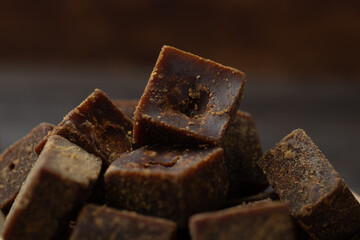 The bowl contains lumps of brown sugar