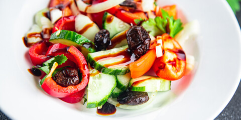 salad dried olives and vegetables a la Greek salad healthy meal food snack on the table copy space food background rustic top view keto or paleo diet veggie vegan or vegetarian food no meat