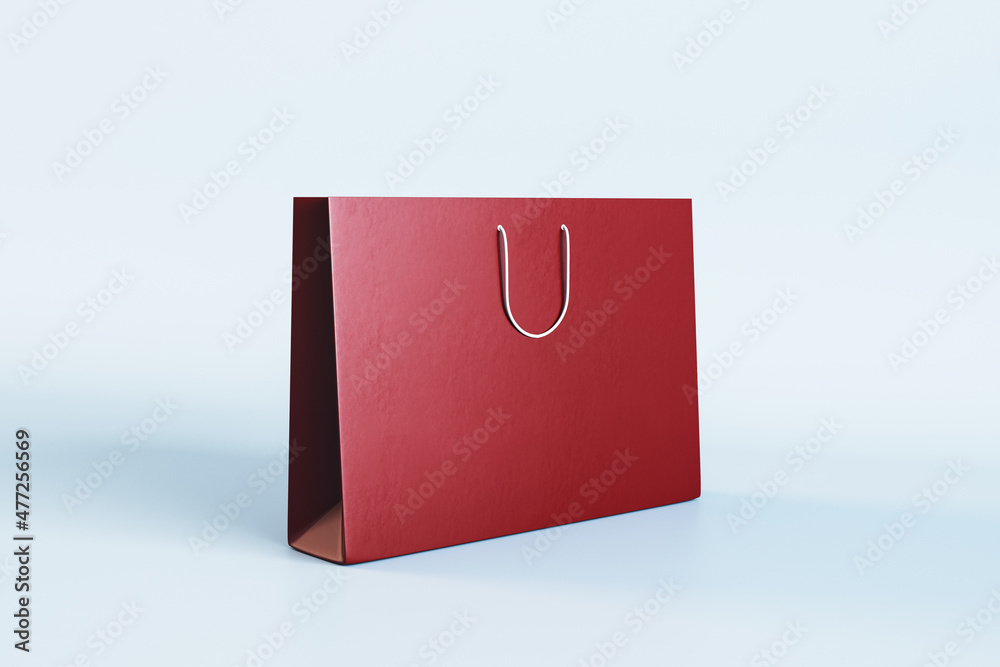 Poster empty red shopping bag with mock up place on white background. christmas, present and packaging conc