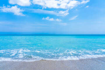 Turquoise water reflects the sky on a Florida beach