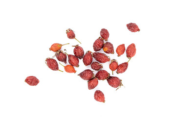 Dried rose hip berries isolated on white