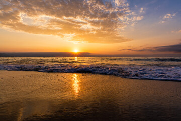 Fototapeta na wymiar Beach Sunset Ocean Wave Seascape