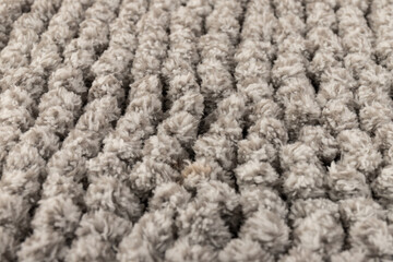 Gray chenille soft bath mat texture background. Bath Accessories. Top view.