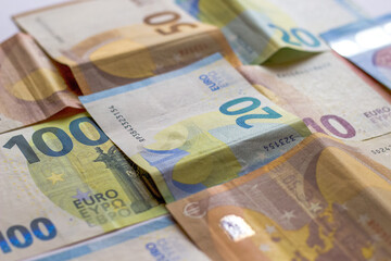 One hundred, fifty, twenty, ten euro banknotes colorful background